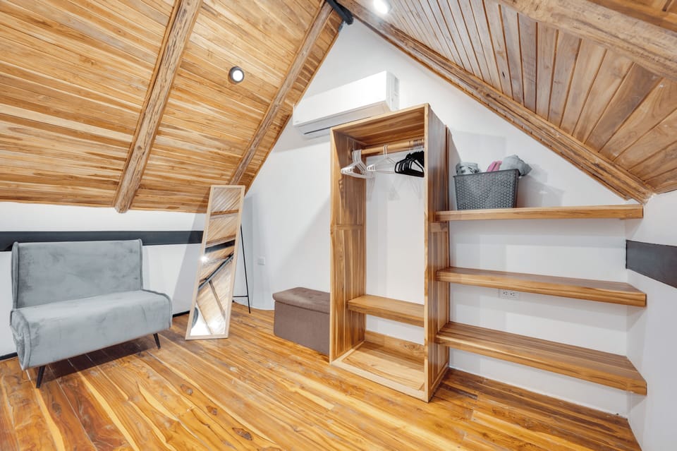 Bedroom- Wardrobe, small couch pulls out to a single sleeper