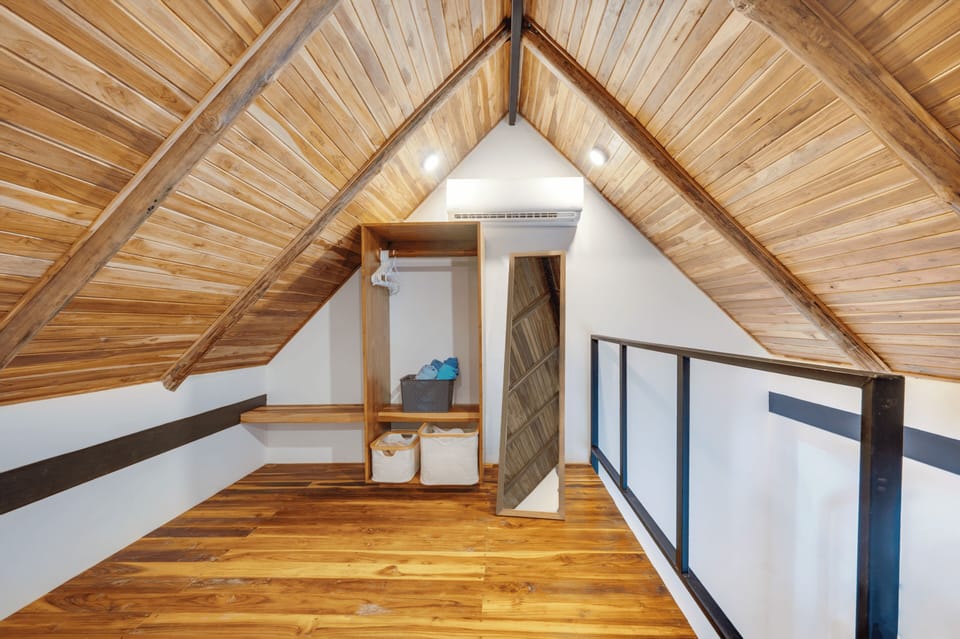 Loft upstairs hallway, wardrobe — vaulted wood ceilings