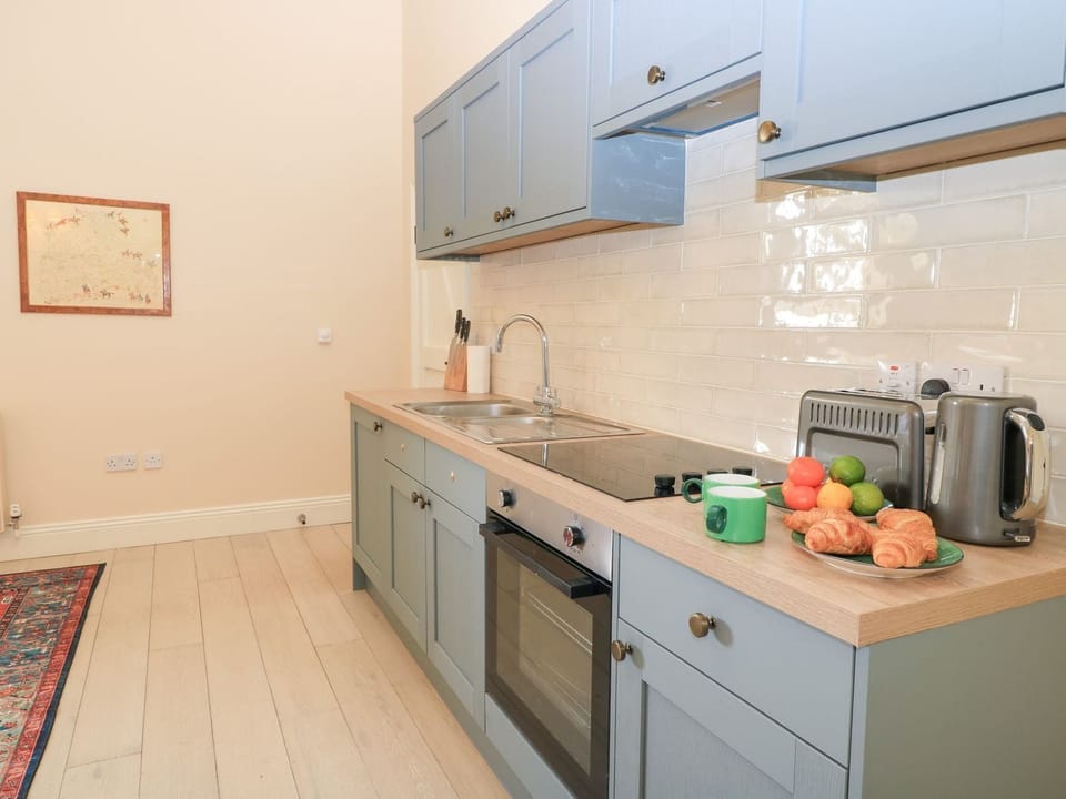 Fridge, toaster, cookware/dishes/utensils