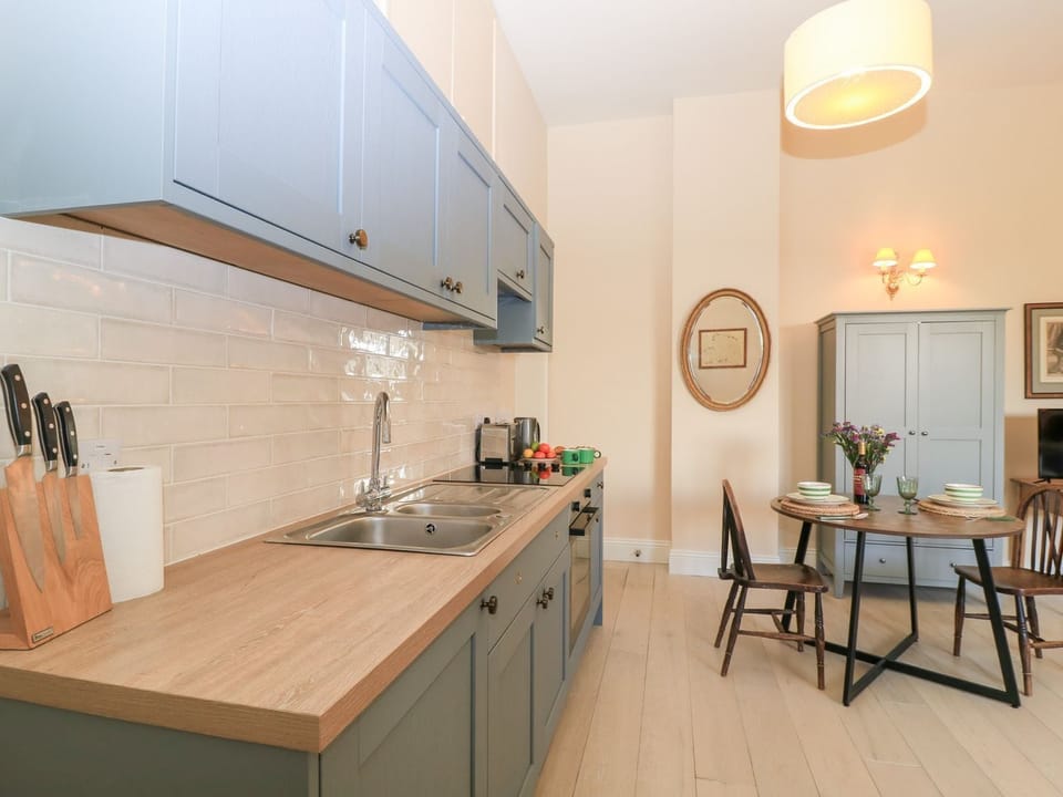 Fridge, toaster, cookware/dishes/utensils