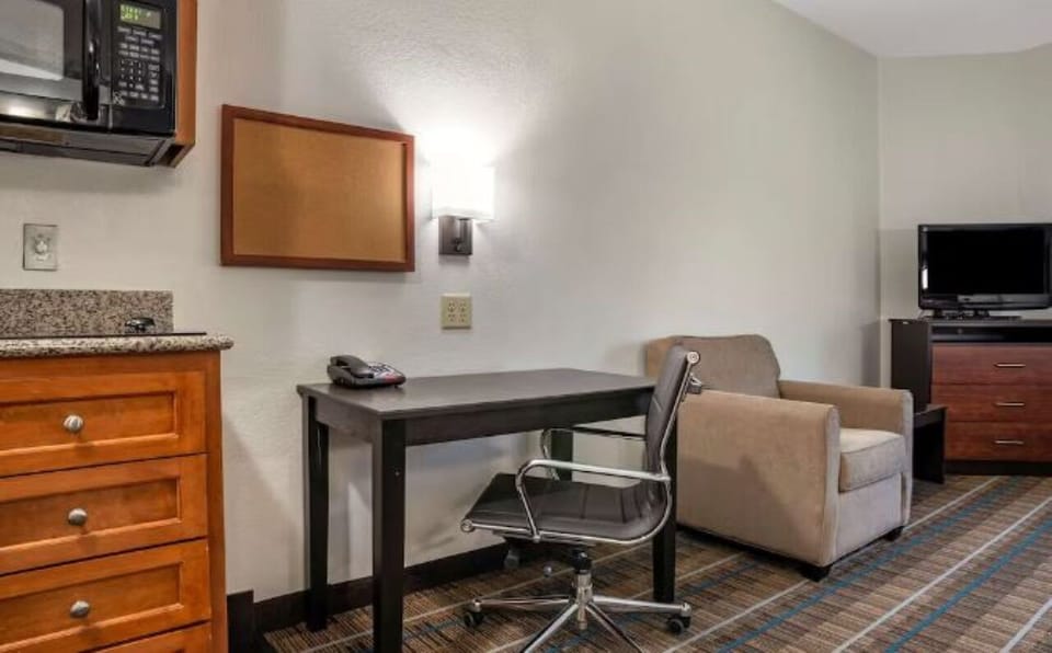 Catch up on emails comfortably with dedicated desk space.