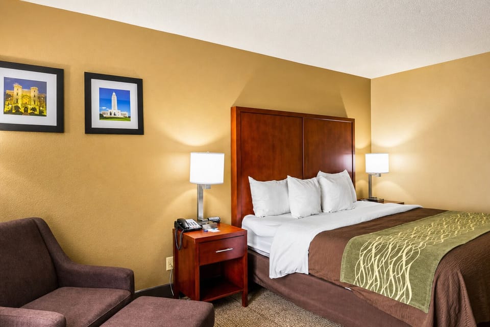 Unwind in a cozy king bed with soft pillows.