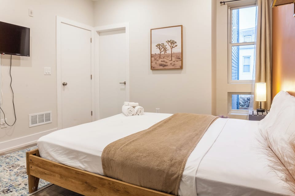 Unwind in the embrace of our inviting cozy bedroom, designed to provide you with a serene escape.