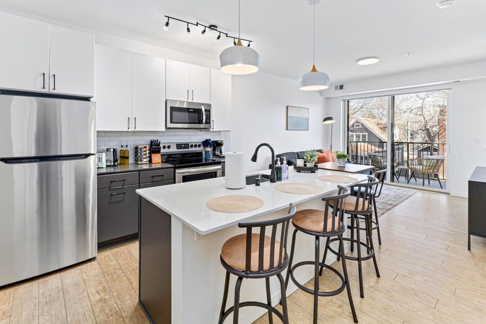 Kitchen: Spacious layout with sleek finishes, perfect for creating memorable meals together!