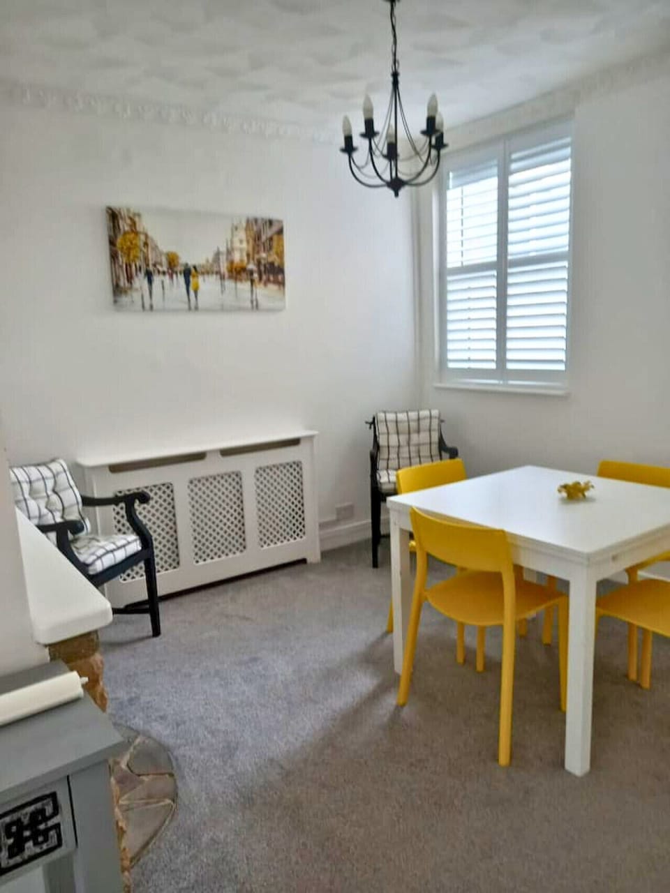 Bright dining space with modern decor and seating for six