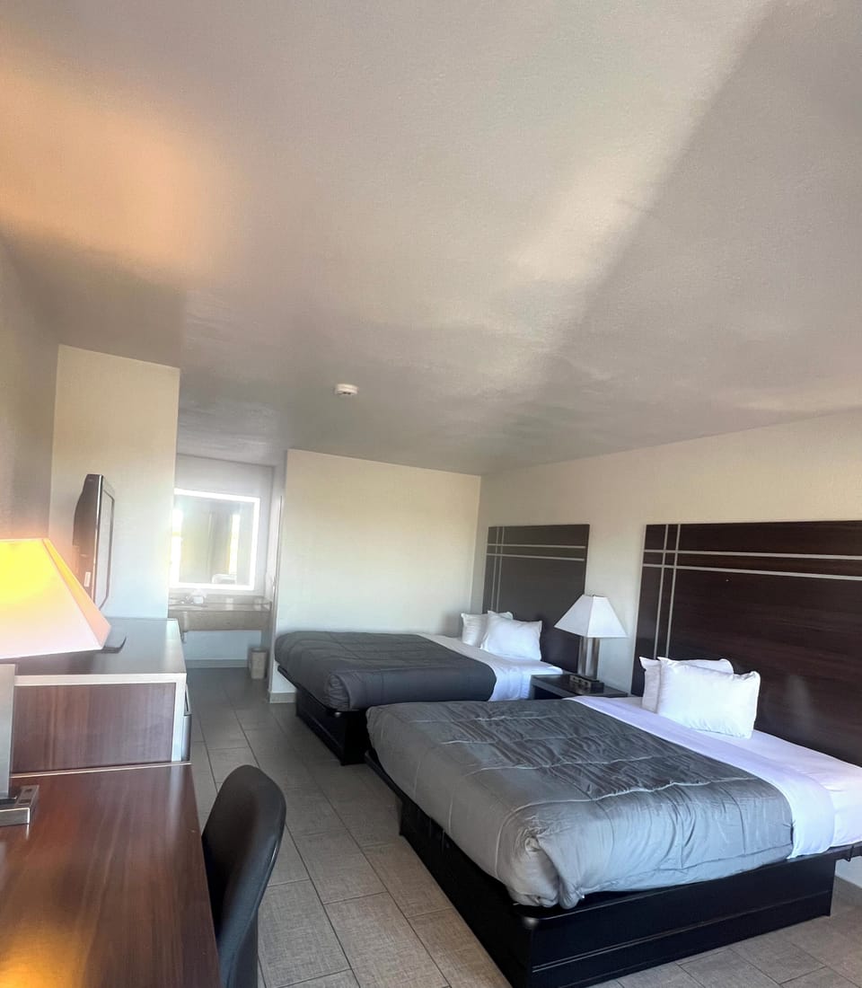Basic Double Room, 2 Queen Beds | Desk, laptop workspace, WiFi (free)
