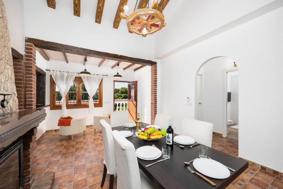 Dining area with ornamental fireplace