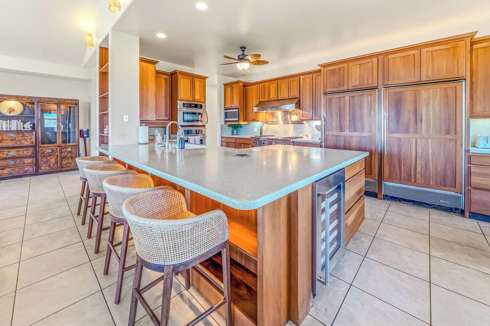 Chef's Kitchen complete with double Sub Zero Fridge, Wolf Range and Ovens as well as wine fridge. Counter Seating, perfect for a breakfast bar! 