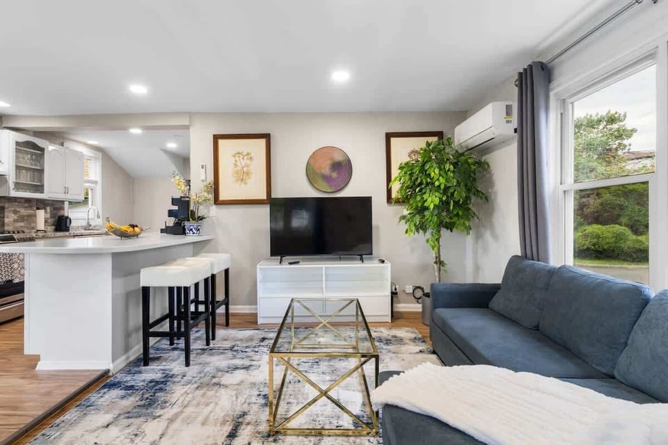 Open-concept comfort—relax in the living room while staying connected to the kitchen and conversation.