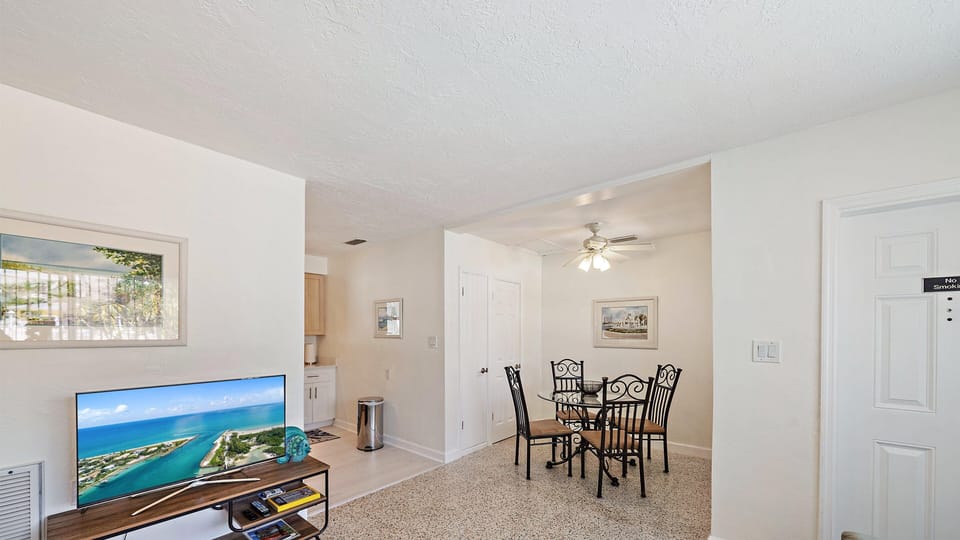 Open floor plan with access to kitchen and bedrooms.