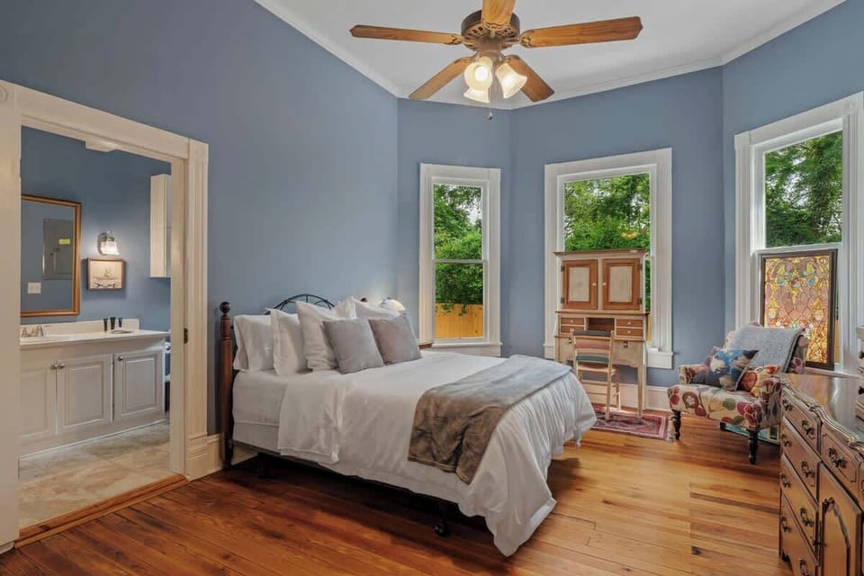 Sophisticated comfort meets simplicity in this thoughtfully designed guest bedroom—ideal for families or colleagues traveling together.