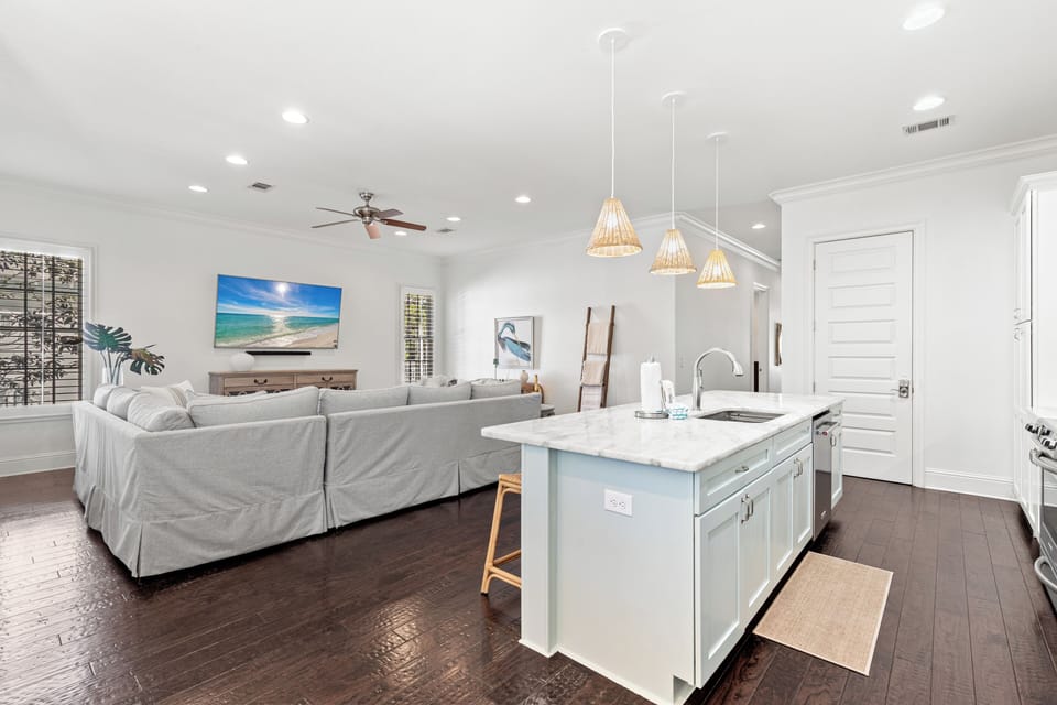 Relax in your bright open-concept space where kitchen and living room flow seamlessly together for perfect vacation gatherings.