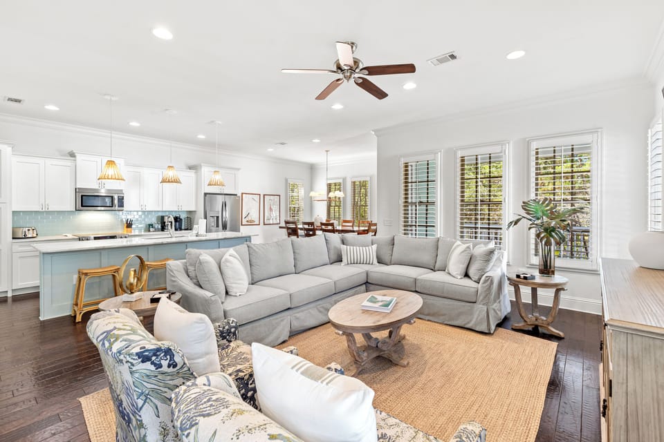 Relax in your bright, open living space where coastal vibes meet modern comfort—perfect for gathering with family and friends.