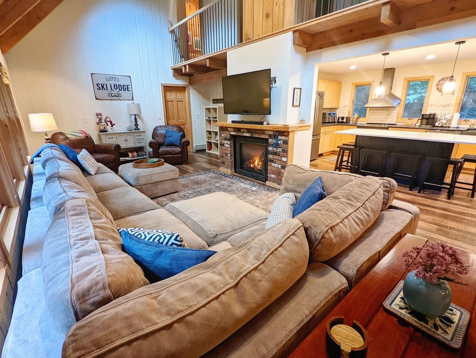 The spacious and cozy living room is ideal for spending time with your family and friends.