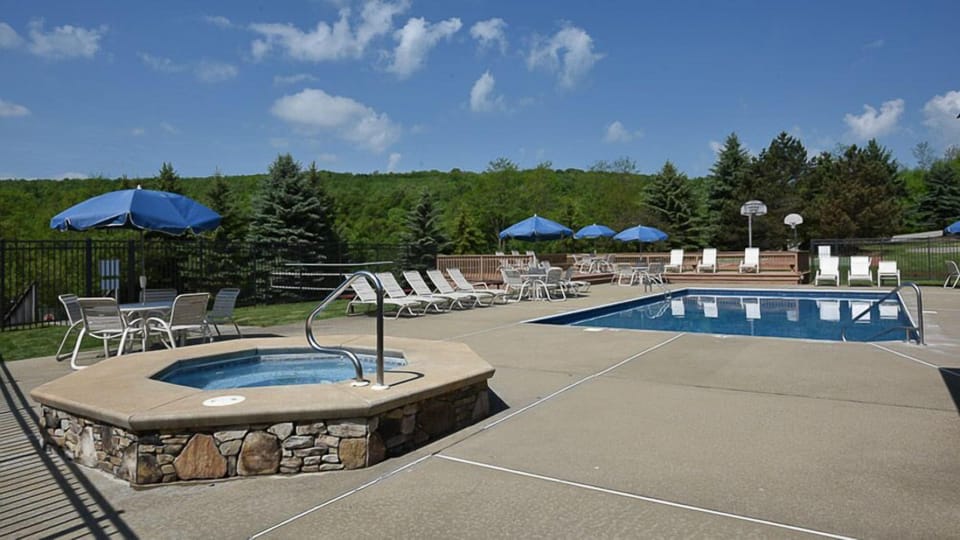 Serene pool area offering the ultimate spot to relax, unwind, and take in the beauty of the Laurel Highlands.