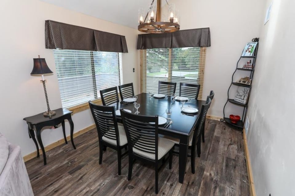 Spacious dining area with natural light and seating for eight—perfect for group meals and game nights.