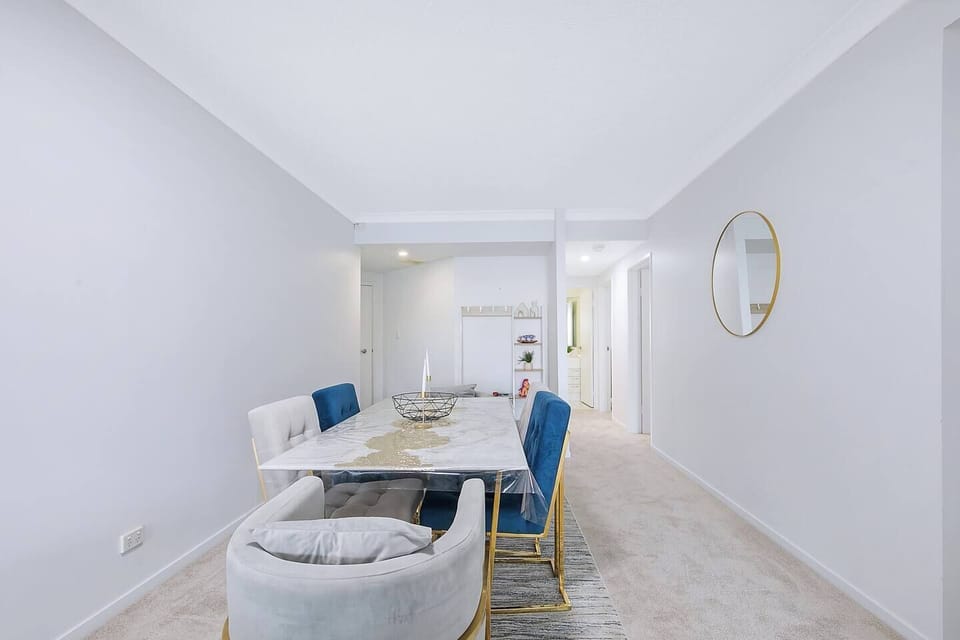 The six-seater dining table sets the scene for shared meals and easy connection.