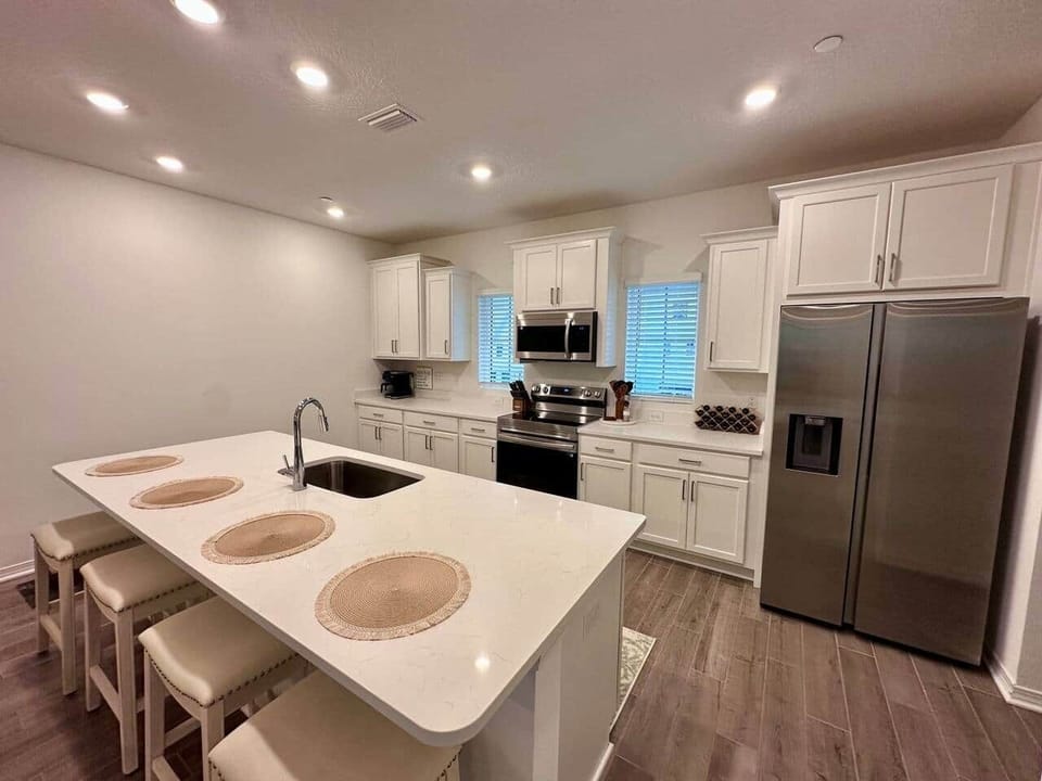 Full-sized stainless appliances, as well as a variety of small appliances, make it easy to prepare gourmet meals for your crew. No judgement if you opt to just pop a quick pizza in the oven (pans/stone provided) and get back to enjoying the beach!