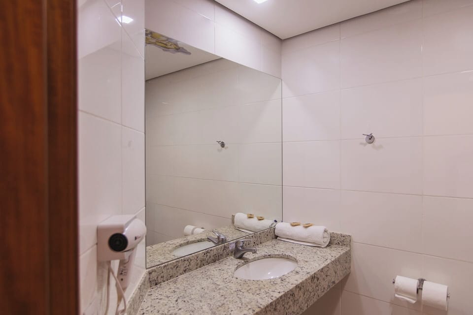 Shower, eco-friendly toiletries, slippers, towels