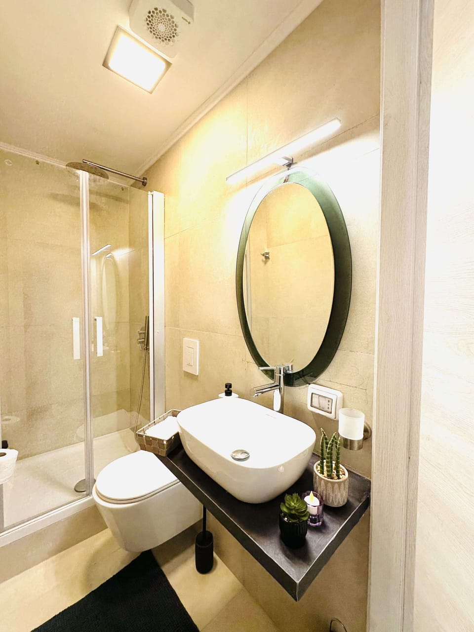 Shower, free toiletries, hair dryer, slippers