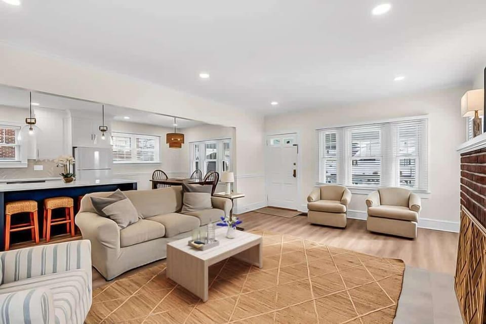 Our open concept living room / kitchen/ dining area is the perfect gathering spot for the family to relax after a long day at the beach.