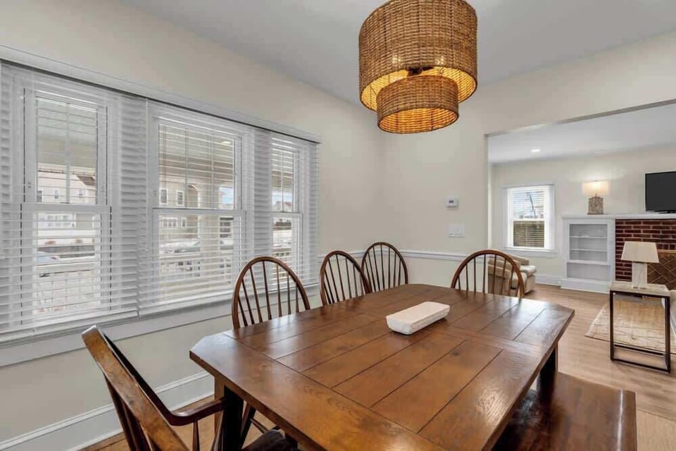 Our dining room comfortably fits 8 people while the kitchen island has more seating !   Plenty of room for the entire family! 