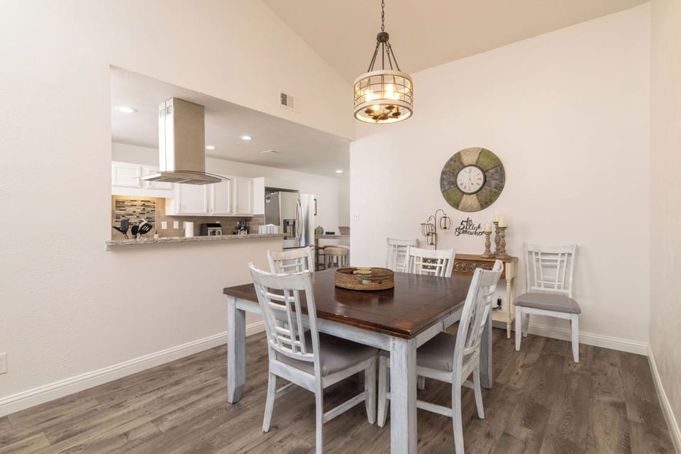 Open-concept dining area able to seat up to 8 people - perfect for family meals