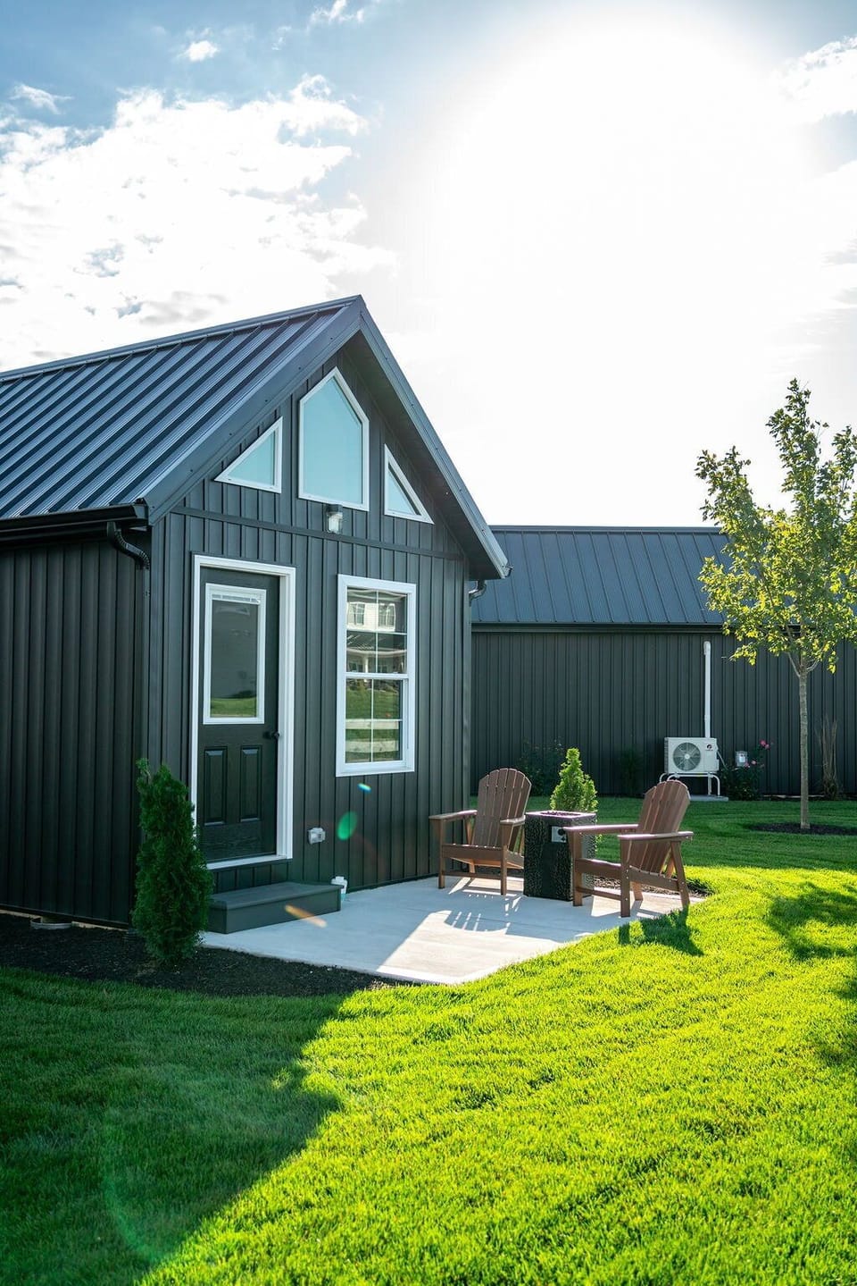 Drink your morning cup of coffee from the comfort of the back patio with two chairs & a fire pit.