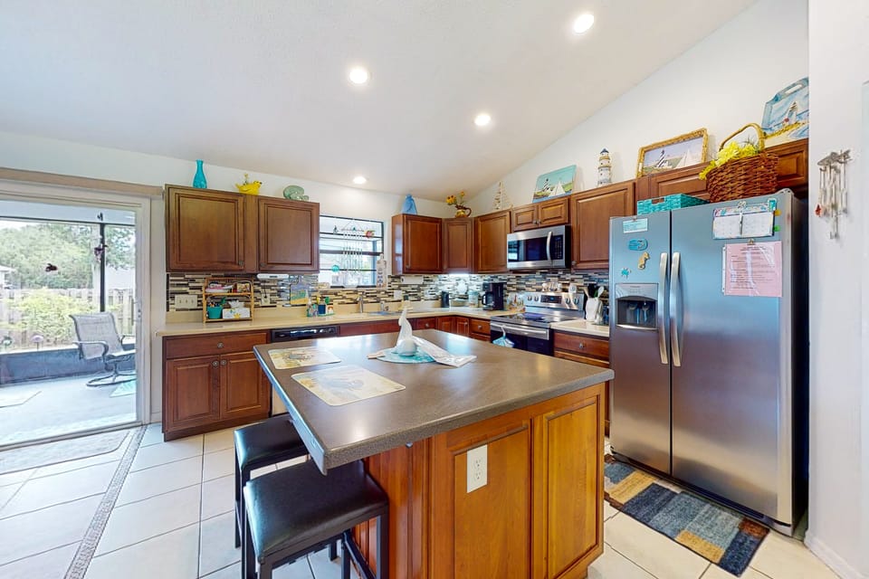 Fully equipped kitchen with everything you need to make your favorite meals!  Breakfast bar seats two