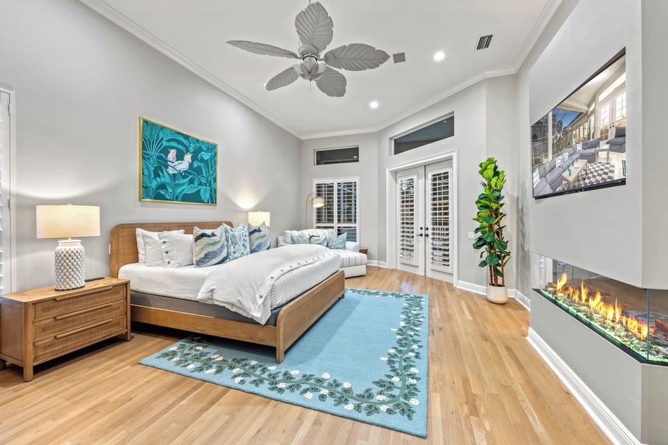 Wake in bedroom 1, a tranquil suite featuring plush bedding, spa-inspired finishes, and serene views.