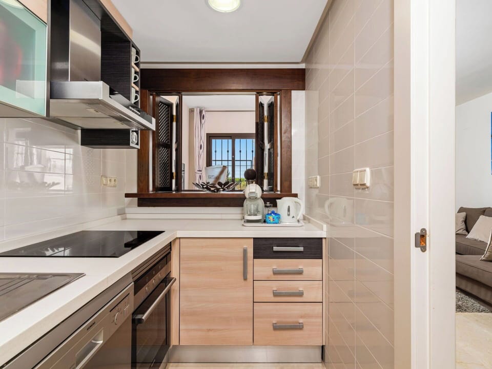 Countertop, Cabinetry, Kitchen, Interior Design, Furniture, Kitchen Appliance, Wood, Flooring, Major Appliance, Home