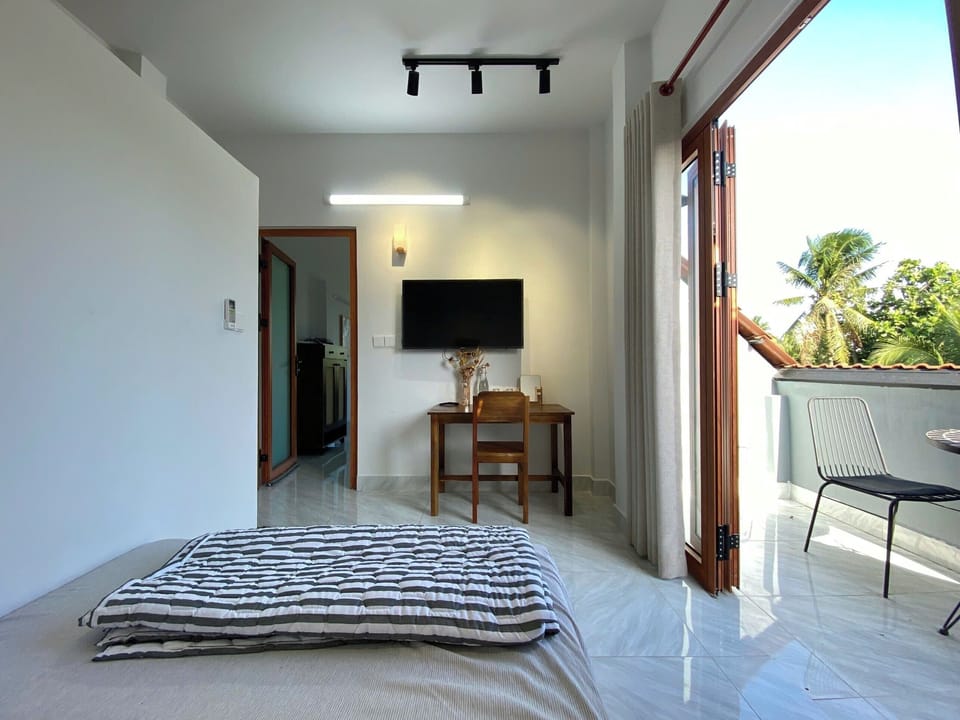 Deluxe Room, Balcony, Garden View | Blackout drapes, free WiFi, bed sheets
