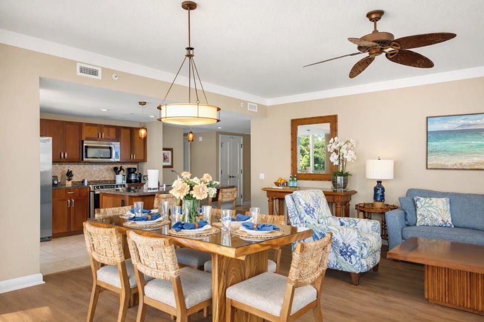 Warm wood cabinetry and generous counters frame your kitchen and dining area, making it easy to prepare meals while staying connected with everyone nearby. HKH-515