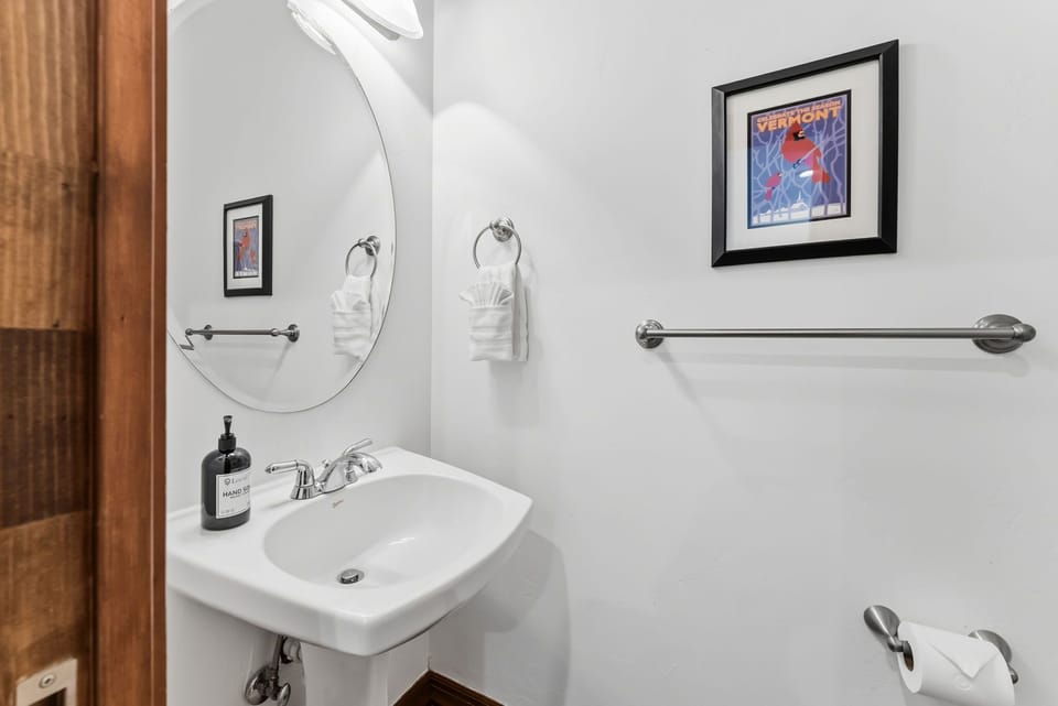 Half bathroom [main floor]: Located near entry and living area