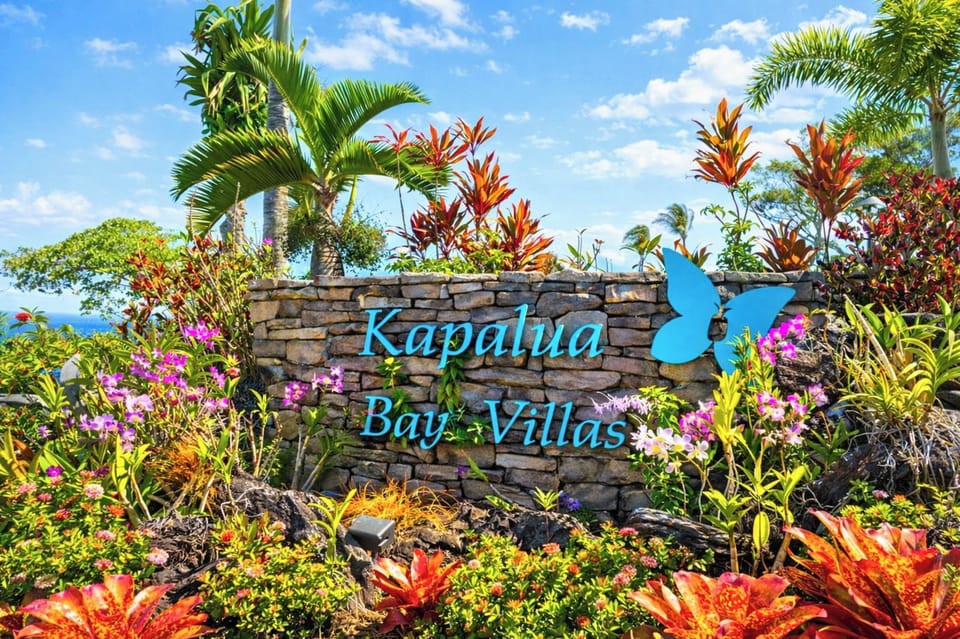 Welcome to Kapalua Bay Villas, a tropical oasis where vibrant gardens and serene beauty welcome you to paradise. Discover your perfect island retreat surrounded by colorful blooms and lush greenery.