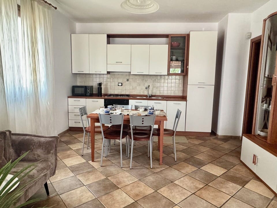 Furniture, Flooring, Floor, Interior Design, Wood, Table, Kitchen & Dining Room Table, Kitchen, Kitchen Appliance, Chair