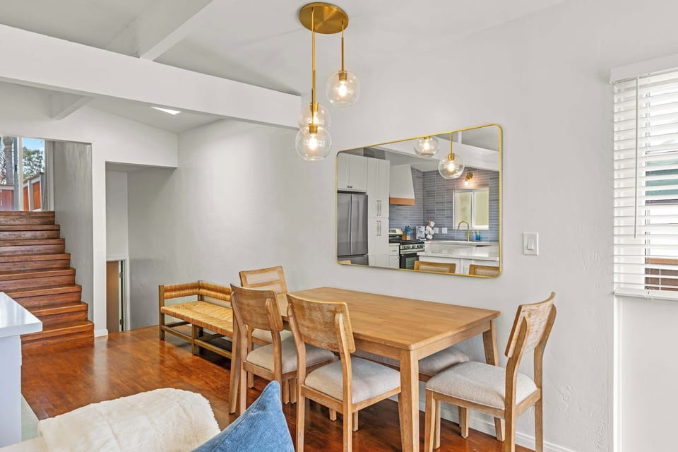 Dining table adjacent to the living room and the Kitchen