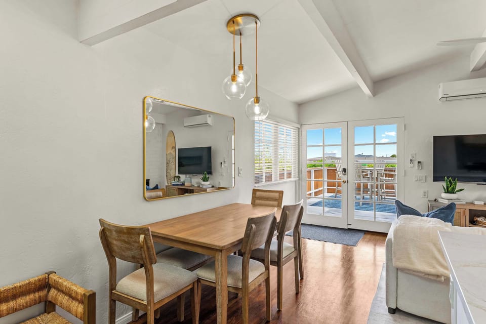Dining table adjacent to the living room and the Kitchen