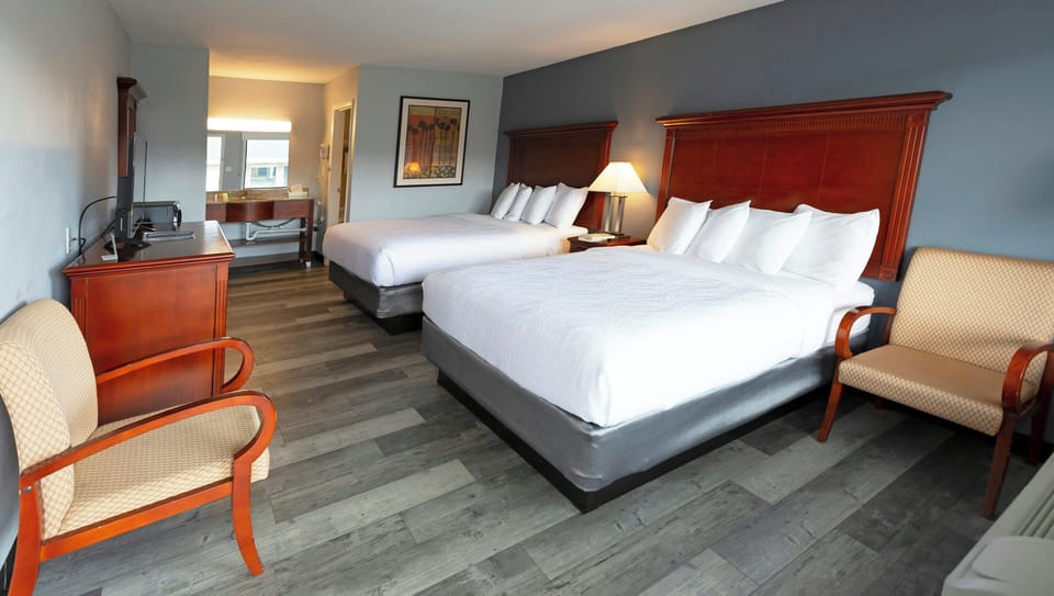Premium bedding, blackout drapes, soundproofing, iron/ironing board