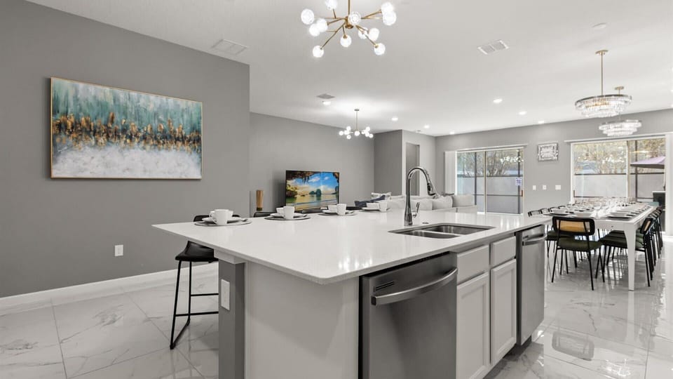 Kitchen: Fully equipped modern kitchen with stainless steel appliances, ample counter space, and everything you need for home-cooked meals.