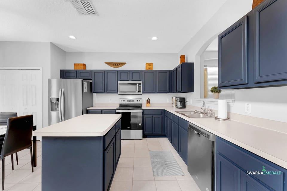 Cook your favorite meals in this fully equipped kitchen with modern appliances & huge counter space.
