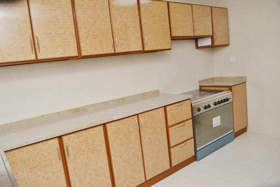 Full-size fridge, microwave, cookware/dishes/utensils