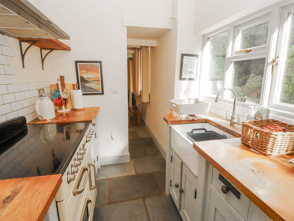 Fridge, microwave, toaster, cookware/dishes/utensils