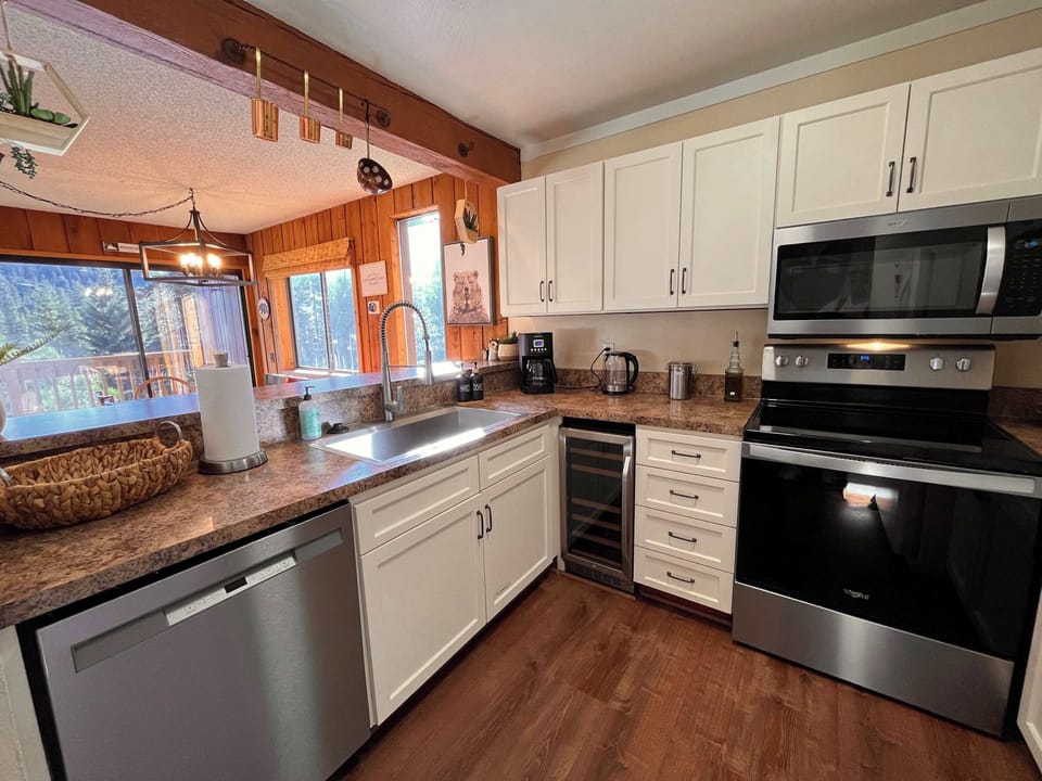 Fully stocked kitchen with upgraded appliances.