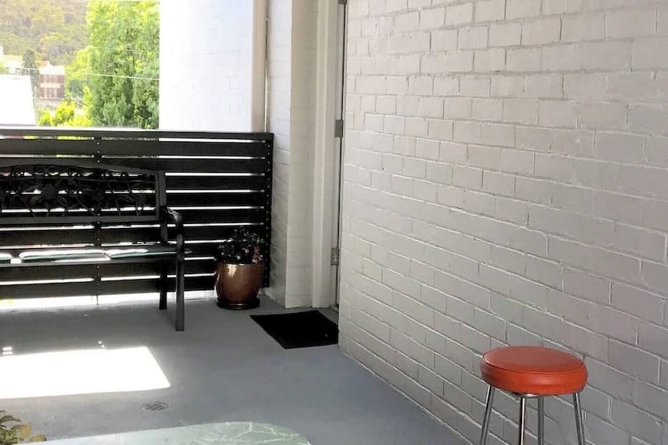 The entrance offers a quaint alfresco area with a bench to enjoy your morning cuppa in the crisp air.
