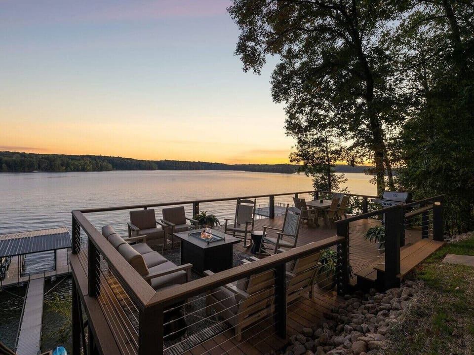 Take in the gorgeous sunsets from the infinity deck with fire pit,  sitting/dining area, and grill