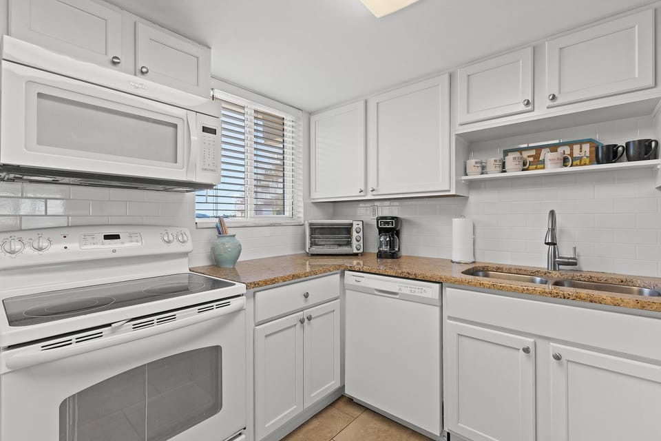 Condo, Multiple Beds (Ocean Club North A103) | Private kitchen | Oven, toaster