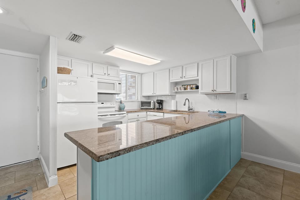 Condo, Multiple Beds (Ocean Club North A103) | Private kitchen | Oven, toaster