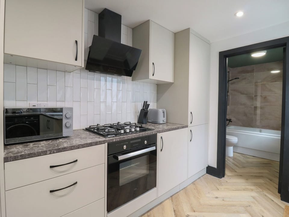 Fridge, microwave, toaster, cookware/dishes/utensils