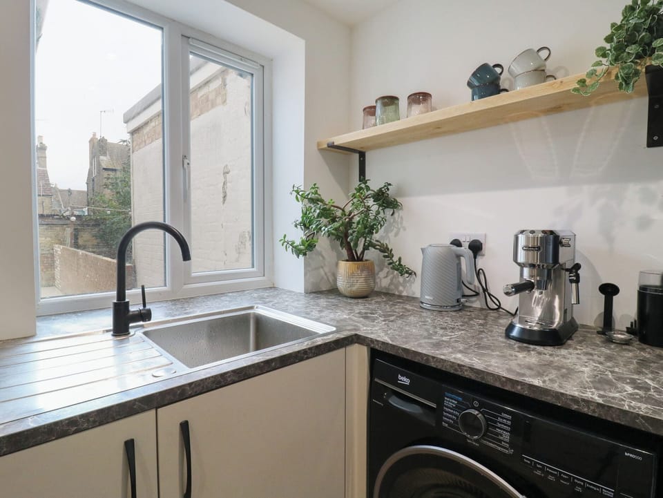 Fridge, microwave, toaster, cookware/dishes/utensils